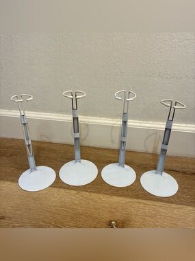 Lot 4 White Metal Stands Designed Display Dolls Action Figures

Good Condition